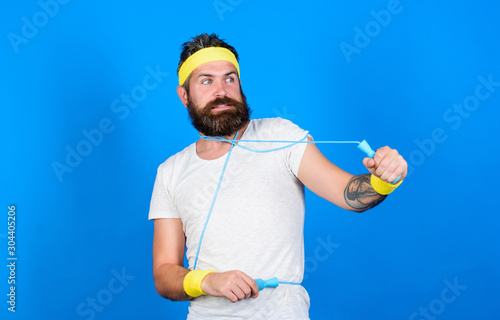 Funky style. Sport shop equipment. summer activity. Man bearded athlete hold jumping rope. motivation concept. mature sportsman. fitness instructor do exercise in gym. lead healthy lifestyle © be free