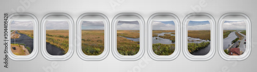 Beautiful scenic view of Everglades National Park through the aircraft windows © jovannig