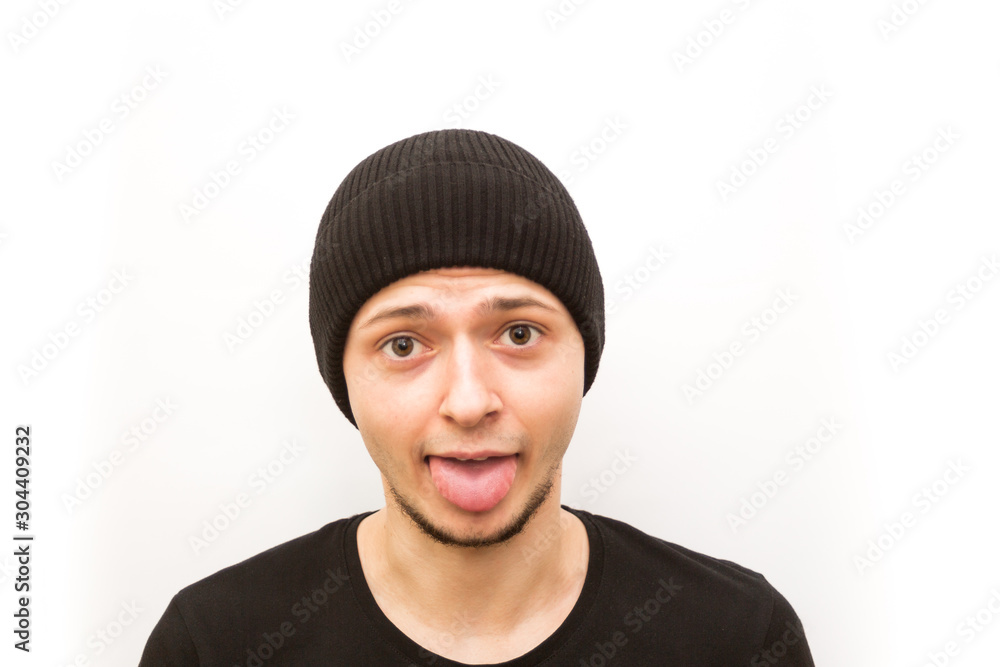 emotion stuck out tongue, young man in a black cap on a white background, man emoji emotion stuck out tongue, young man in a black cap on a white background, man emoji