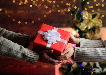 New Year is coming. present for xmas holiday. gift with love. man give woman box. family values. loving each other. hands of couple in love. merry christmas. happy new year. winter holiday weekend