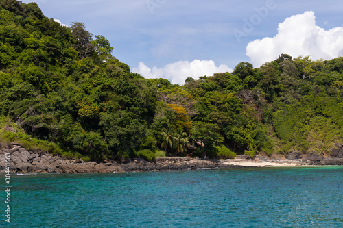 mountain stone coast and sea view in yacht cruise at Phuket, Thailand