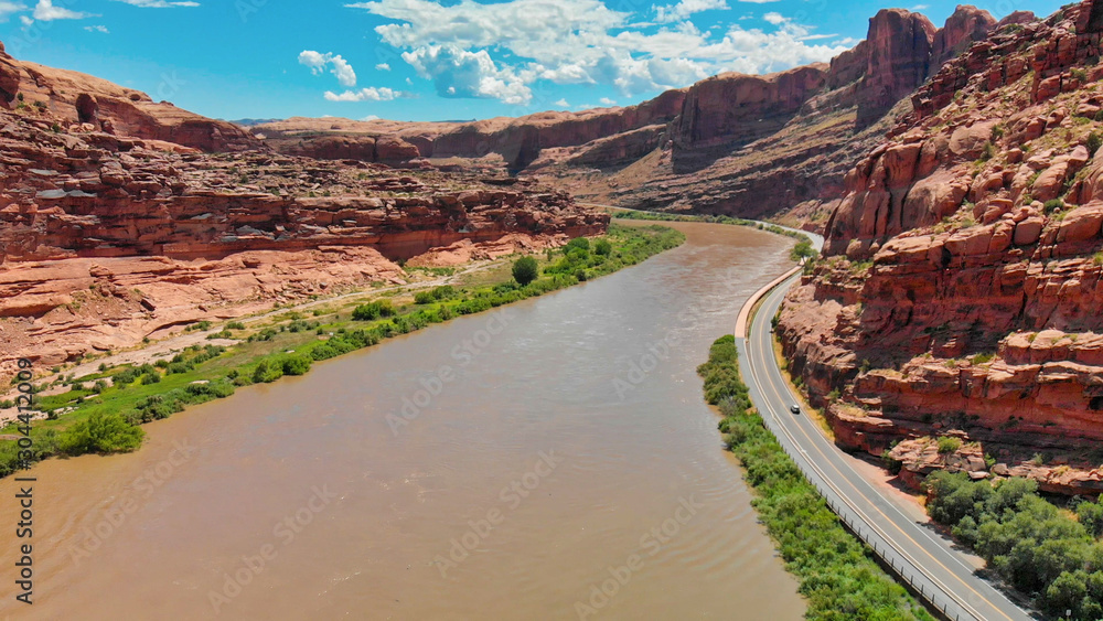 Colorado River near Moab, Utah. Arches National Park gateway, aerial view from drone at sunset