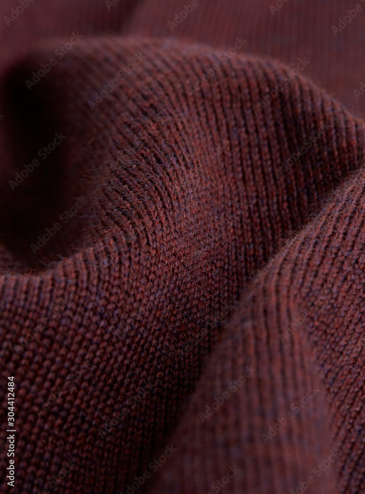 Textile - Fibers close-up showing paterns of the fabric. Soft background and ondulations creating shadows and volumes Textile - Fibers close-up showing paterns of the fabric. Soft background and ondulations creating shadows and volumes