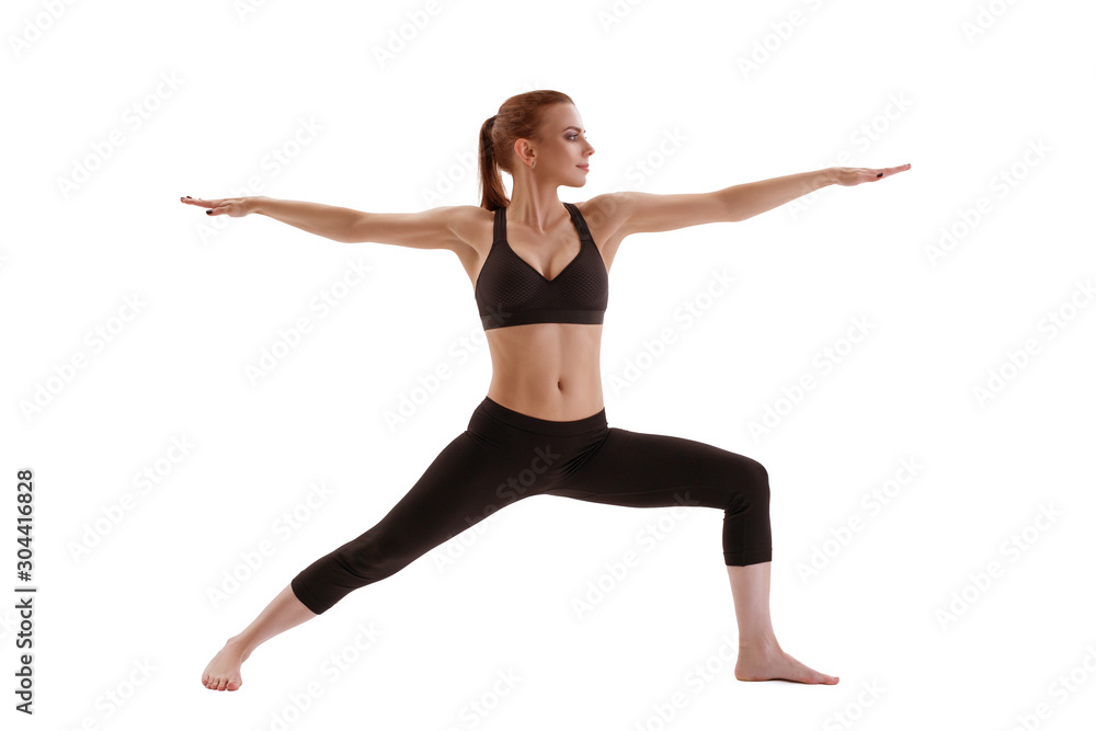 Fitness model exercising studio shot Fitness model exercising studio shot