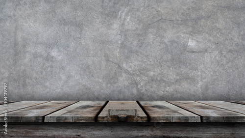 Empty top shelves or table wood on concrete wall background. For product mockup.
