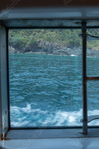 sea surface view from yacht cruise window at Phuket, Thailand