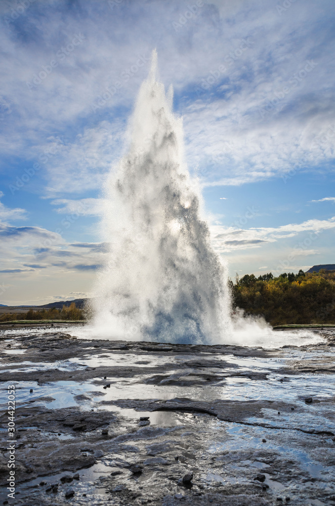 Iceland, September 27, 2019,Icelandic Geyser Strokkur. Great tourist attraction on Golgen Circle Iceland. Vsible geyser valley Iceland, September 27, 2019,Icelandic Geyser Strokkur. Great tourist attraction on Golgen Circle Iceland. Vsible geyser valley