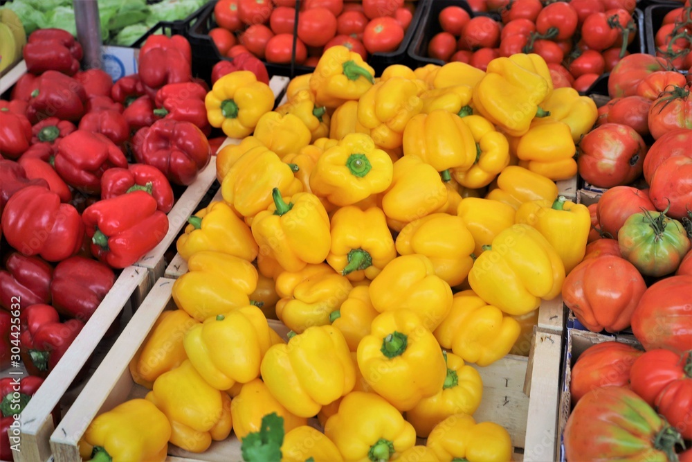 closeup of  peppers on display at the market
