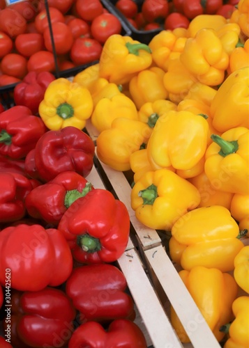 Fototapeta Naklejka Na Ścianę i Meble -  closeup of  peppers on display at the market