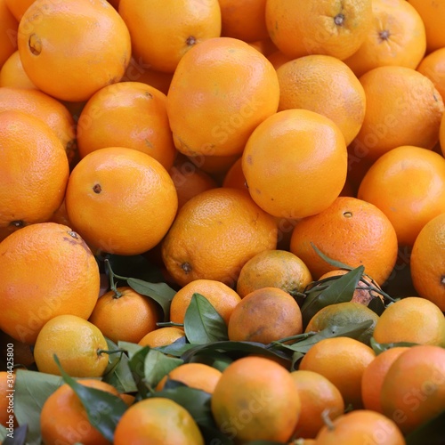 closeup of  oranges on display at the market