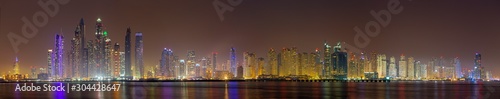 Dubai - The evening panorama of Marina towers from Palm Island.