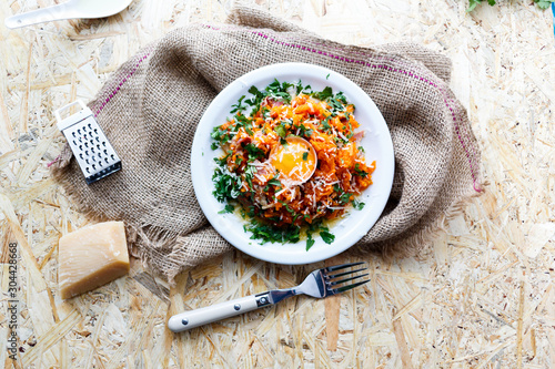 baked pumpkin with egg photo