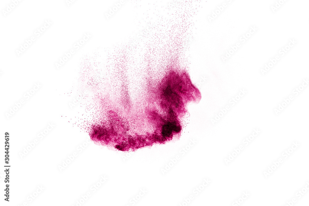 Explosion of pink colored powder isolated on white background.Pink dust splash.