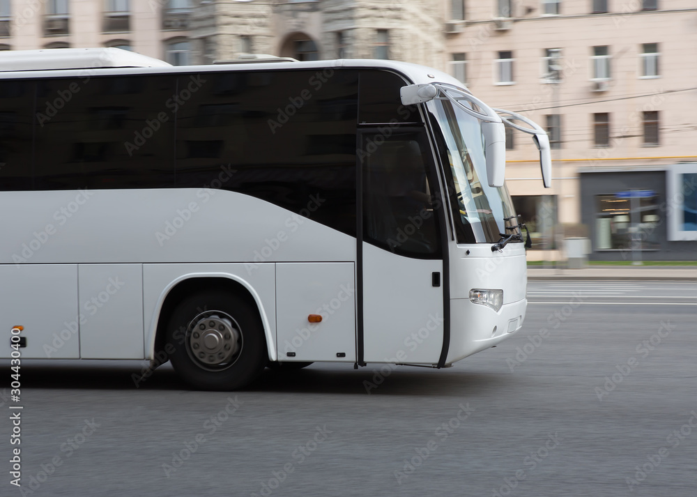 Fototapeta premium bus is moving down the street