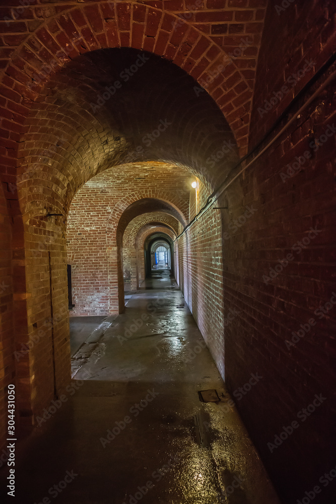 Antique brick arched corridor
