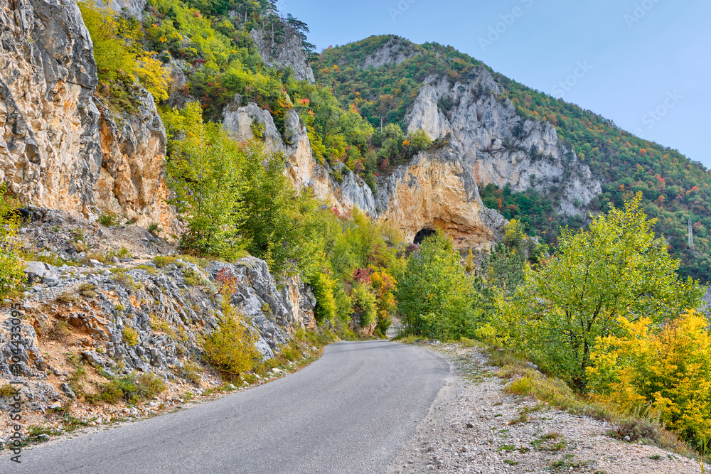 Mountain road among steep cliffs