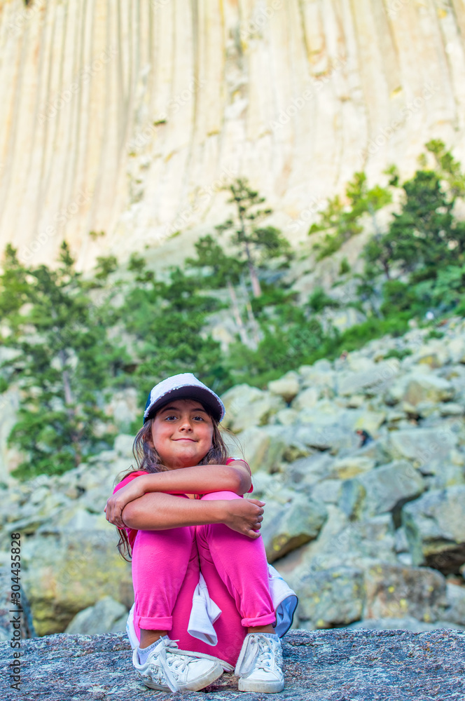 Young girl enjoying Devils Tower trail, Wyoming Young girl enjoying Devils Tower trail, Wyoming