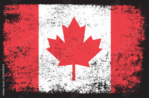 Canada flag in grunge style premium vector