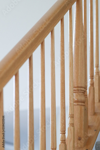 Foto wooden stairs. Stair handrail closeup. - Image