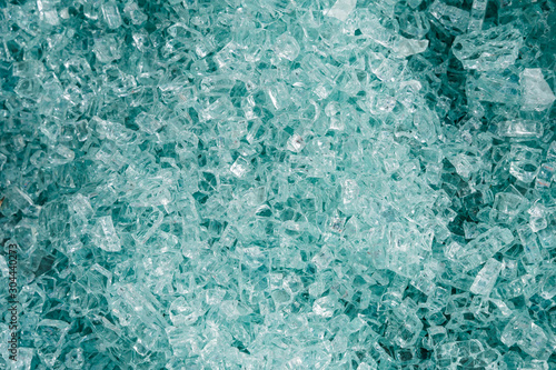 Pile of broken tempered glass texture and close-up