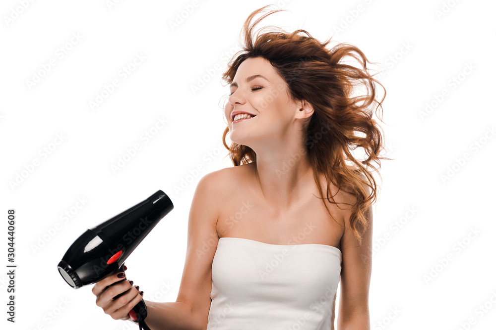 happy curly girl using hair dryer isolated on white happy curly girl using hair dryer isolated on white