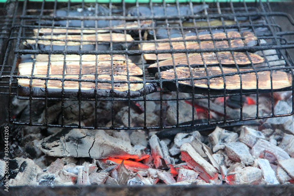 eggplant in the grid on the coals
