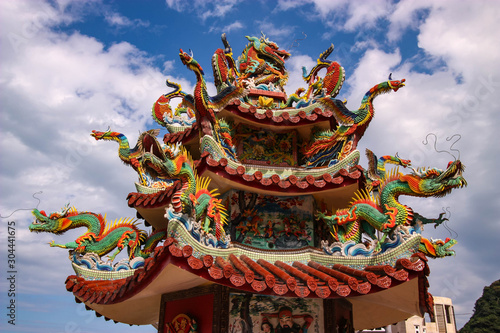 A traditional Chinese decoration on top of a Taiwanese Temple, Taiwan. photo