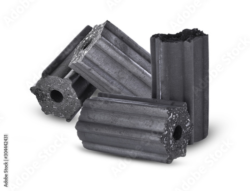 Foto charcoal briquettes on white background