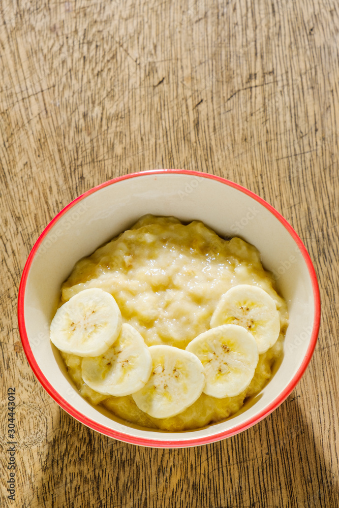 Close up mashed bananas in bowl Close up mashed bananas in bowl