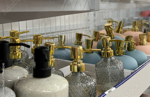 Bottles for soap in a shop window.