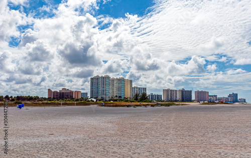 Panoramic view of the Bell Air skyline and beach, on a sunny and cloudy morning. Bell Air Beach, Florida, USA