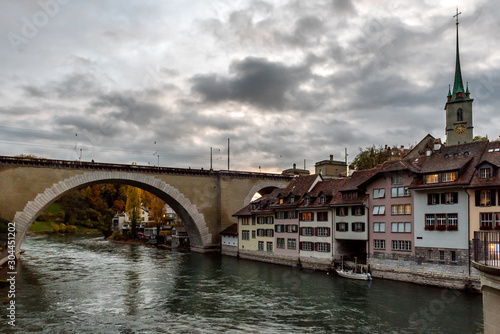 Panoramic view of the Bern old town with the Aare river flowing around the town at sunset in Bern, Switzerland