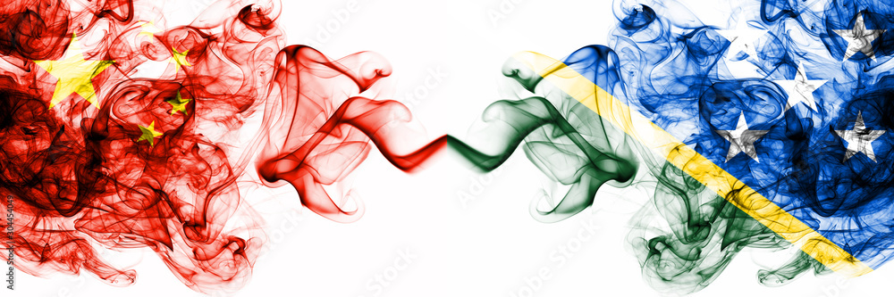 China, Chinese vs Solomon Islands smoky mystic states flags placed side by side. Concept and idea thick colored silky abstract smoke flags