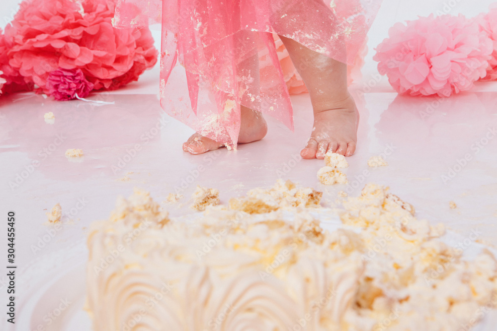 the-baby-s-leg-was-covered-in-food-close-up-birthday-party-stock-photo