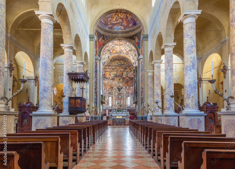 REGGIO EMILIA, ITALY - APRIL 12, 2018: The church Basilica di San Prospero with the Last Judgment fresco in main apsida of by Camillo Procaccini (1585 - 1587).
