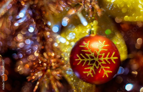 Close up Chistmas tree and New Year decoratetion   Baubles hanging with colorful blur bokeh background and copy space in christmas new year and celebrate concept.