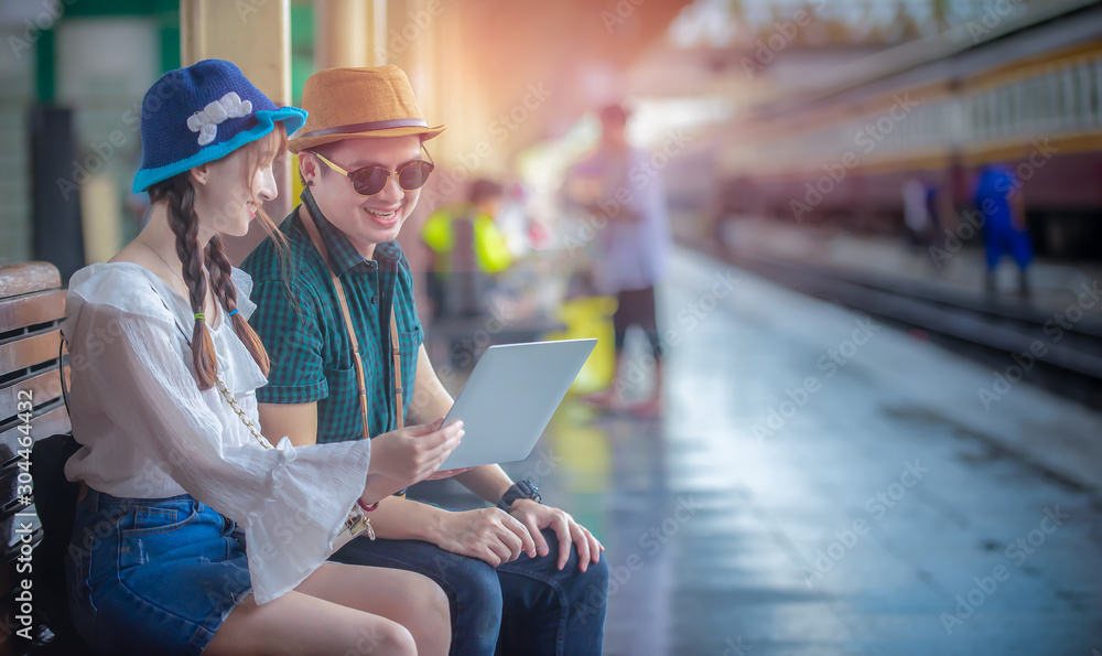 young couple in train station young couple in train station