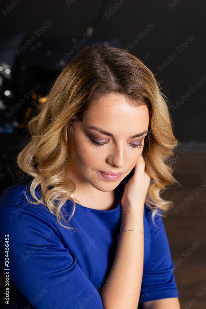 Beautiful woman with in a New Year s interior. Christmas Eve. Beautiful woman with in a New Year s interior. Christmas Eve.