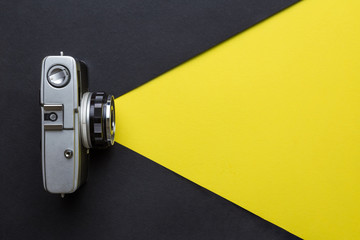 Vintage camera taking photos abstract. Photography concept.
