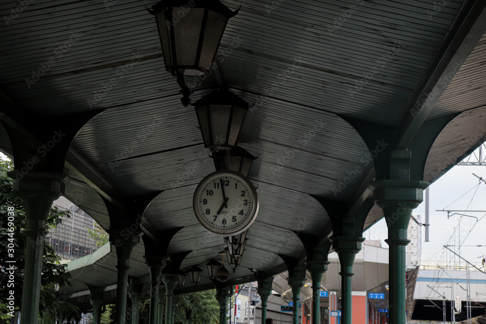 Cracow, evening, clock on the station