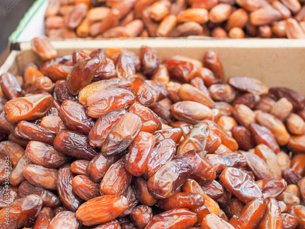Fresh arabic dates or date palm fruit for sale in farm market. Fresh arabic dates or date palm fruit for sale in farm market.