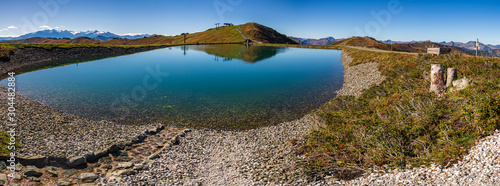 High resolution stitched panorama of a beautiful alpine view with reflections in a lake at Leogang, Tyrol, Austria
