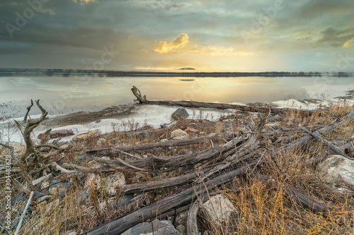 Rural landscapes featuring winter waterfalls and cascades, with barns and snow covered fields in Southern Ontario Canada near Kingston