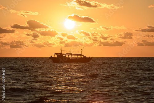 Fishing schooner at sunset © Antonyuk Viktor