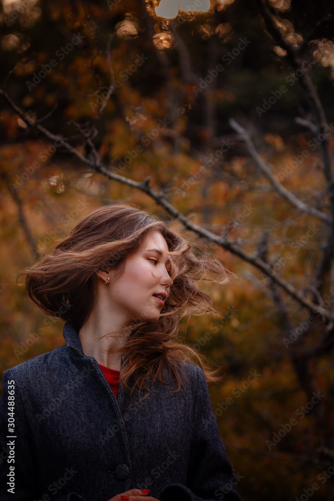 asian girl in coat enjoy autumn forest. asian girl in coat enjoy autumn forest.