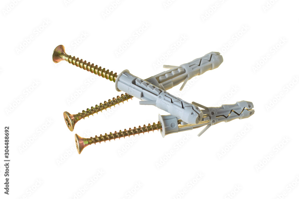 Three new modern dowels for fixing any objects on wall isolated on white background without shadow. Close-up Three new modern dowels for fixing any objects on wall isolated on white background without shadow. Close-up