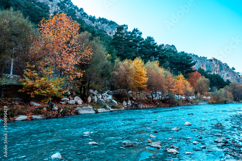 Autumn orange and blue river in Belemedik Town, Adana, Turkey