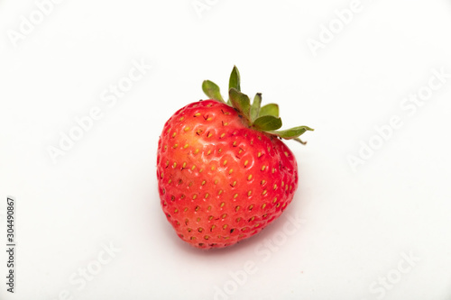 Ripe strawberries on a white background.Close up.
