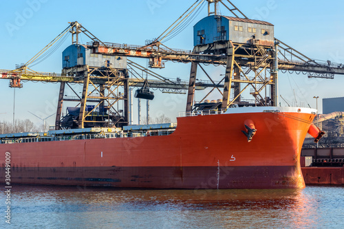 Canvas-taulu Loading of cargo ship in North Sea port of Ghent, Belgium