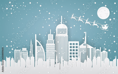 Christmas and happy new year Paper art design blue vector background with cityscape and fireworks celebration concept